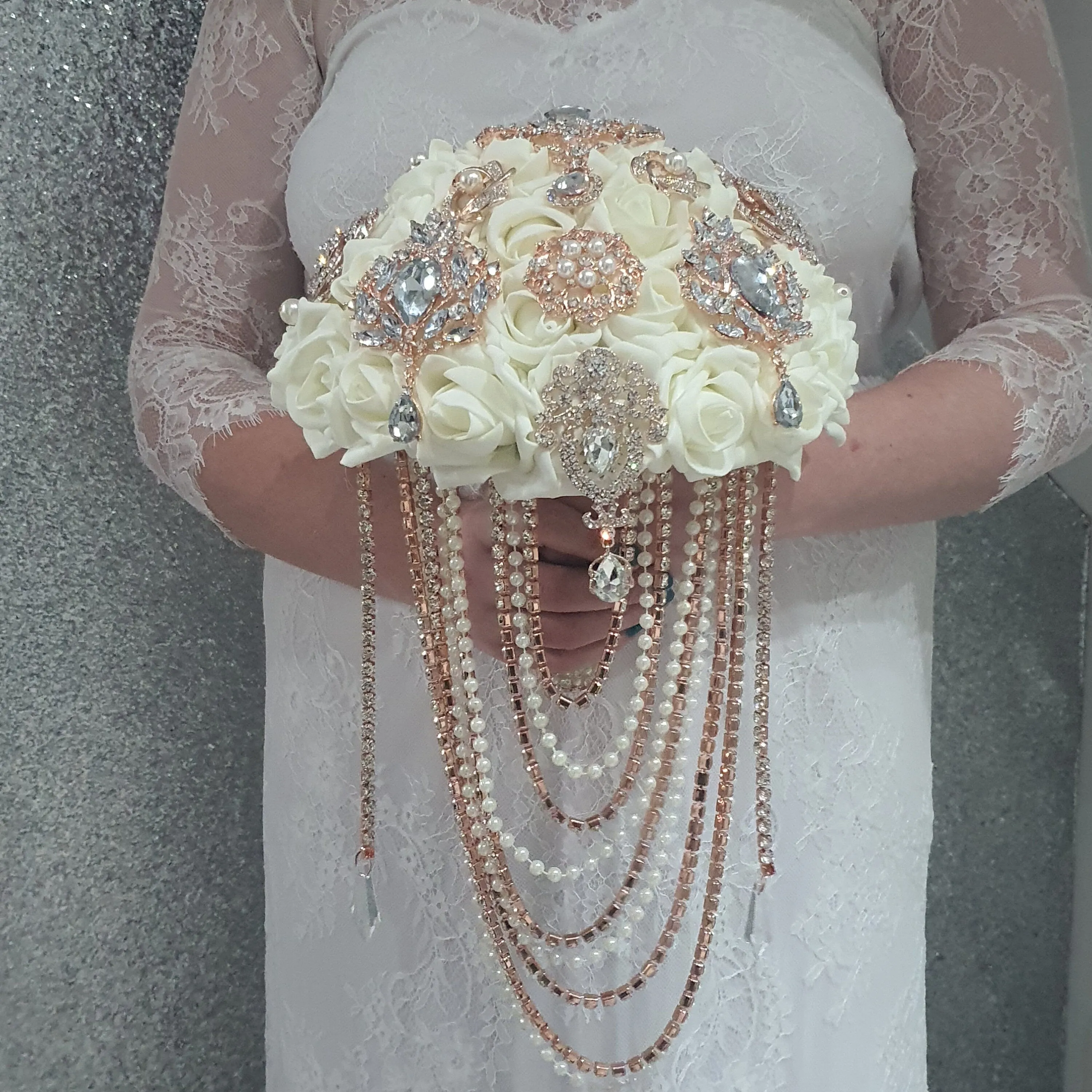 Rose gold Brooch and Pearl drape bouquet by Crystal wedding uk